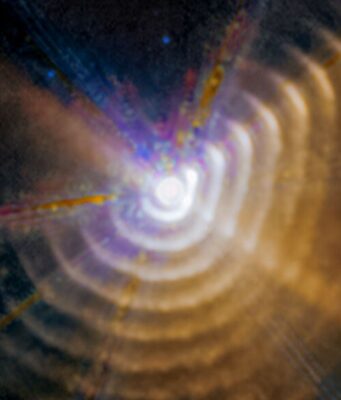 Wolf-Rayet 140: Le Fabbriche di Polvere Cosmiche Rivelate dal JWST