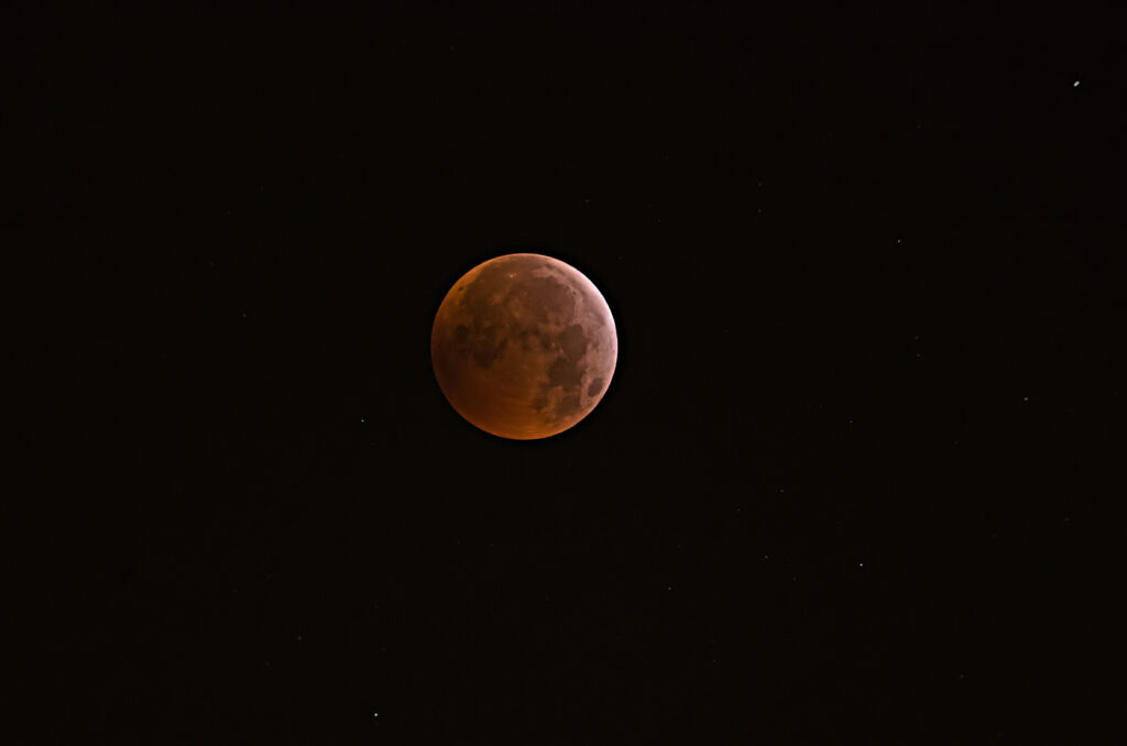 in ombra, quasi nel massimo della totalità